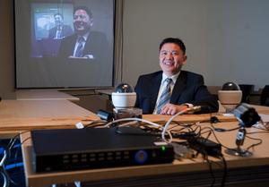Kevin Wan, president and CEO of EP Technology Corp., shows off some of the company's video-security equipment at its offices in Champaign in January 2012.